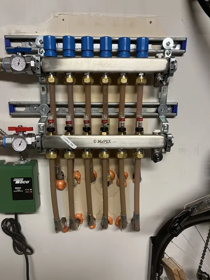 Plumber performing Water Heater Repair at a residential property in Frederickson